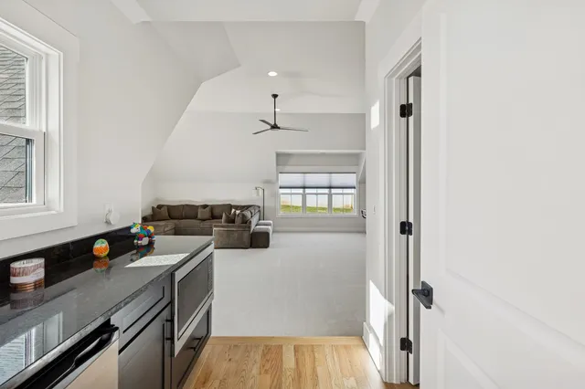 a view of a livingroom with furniture and a couch
