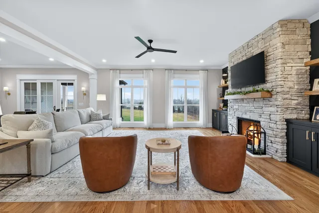 a living room with furniture and a rug