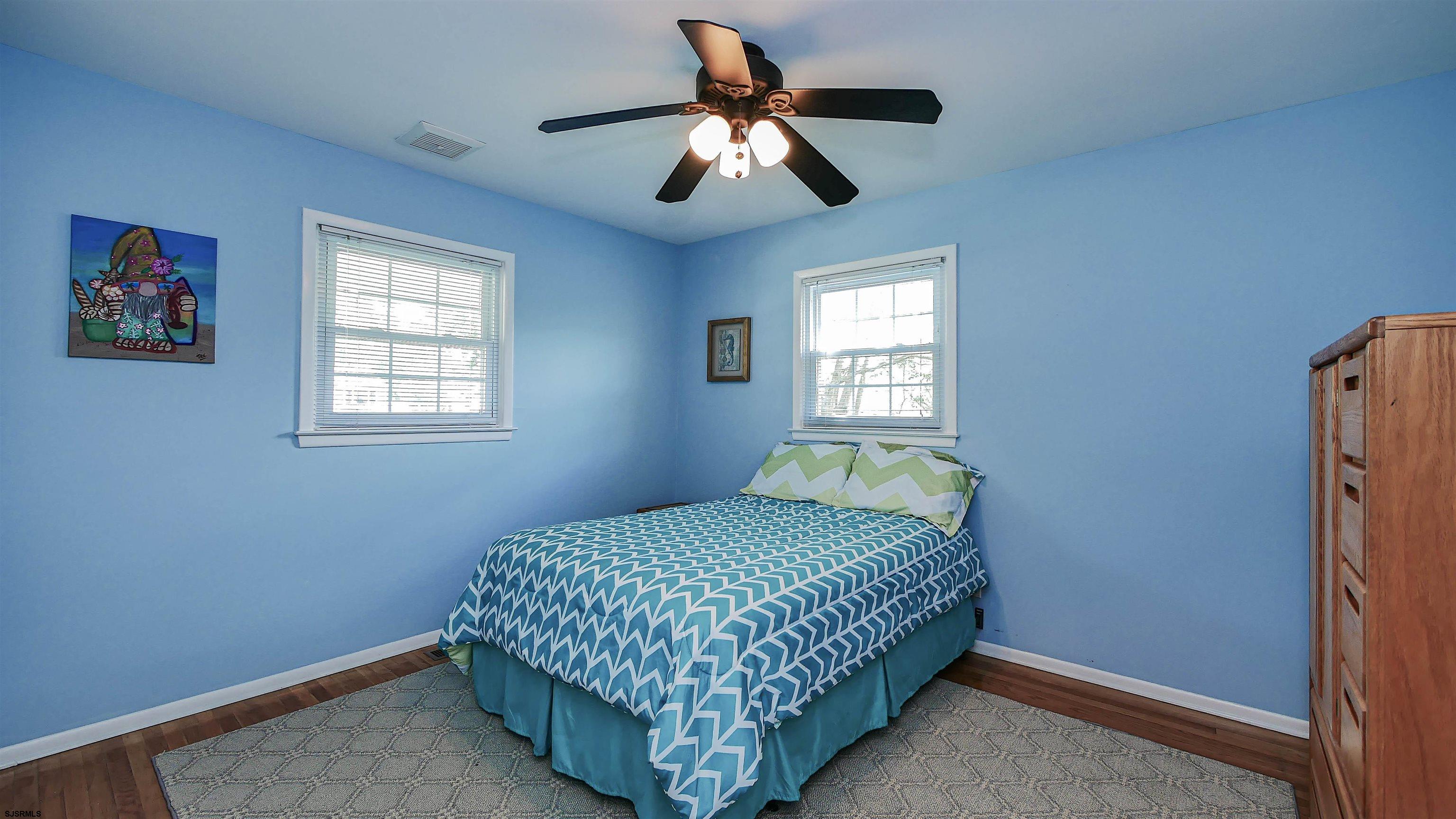 8 Malvern Road Somers Point, NJ 08244 - Photo 16 of 31 a bedroom with a bed and a window