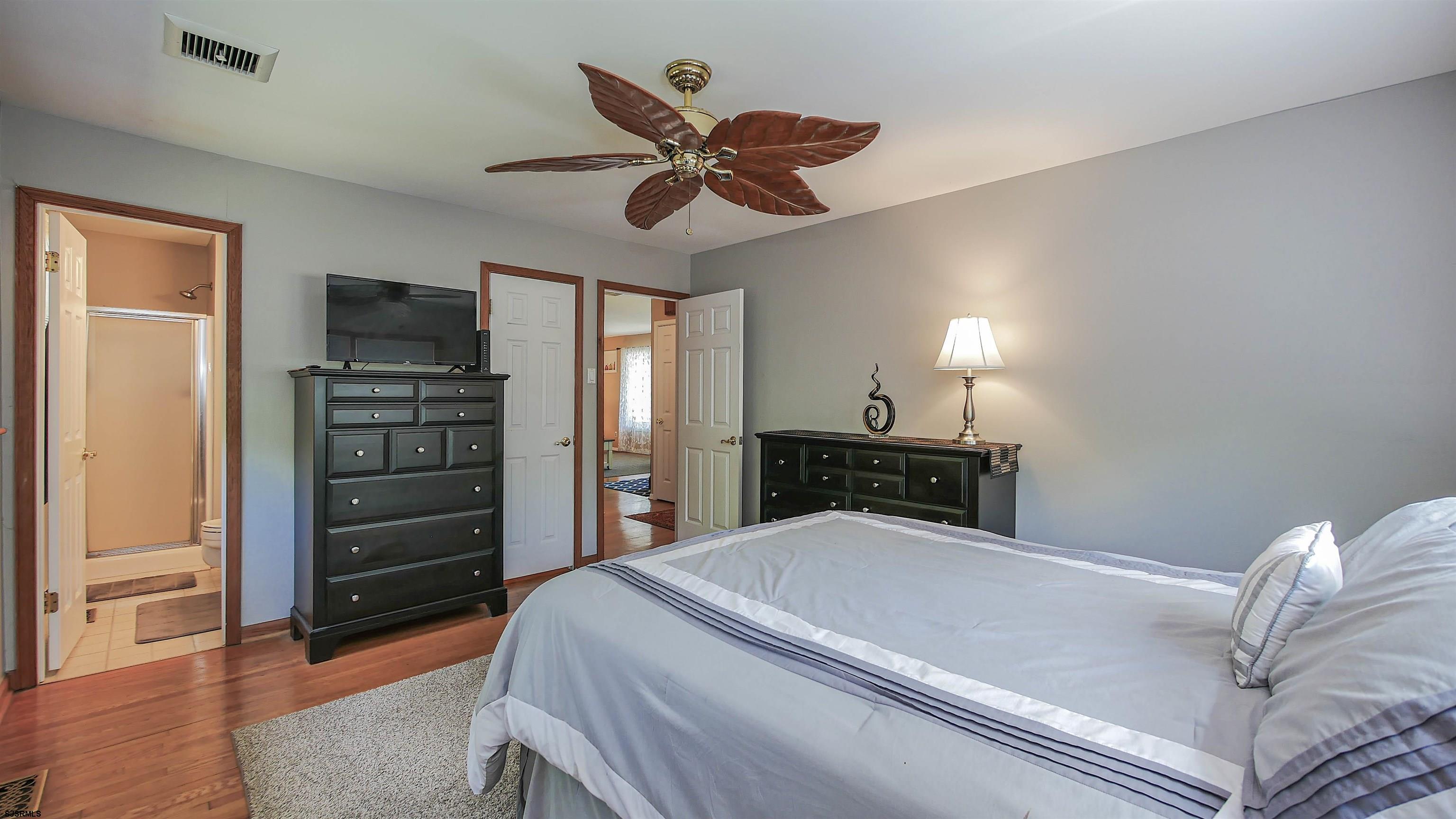 8 Malvern Road Somers Point, NJ 08244 - Photo 20 of 31 a bedroom with a bed and a television