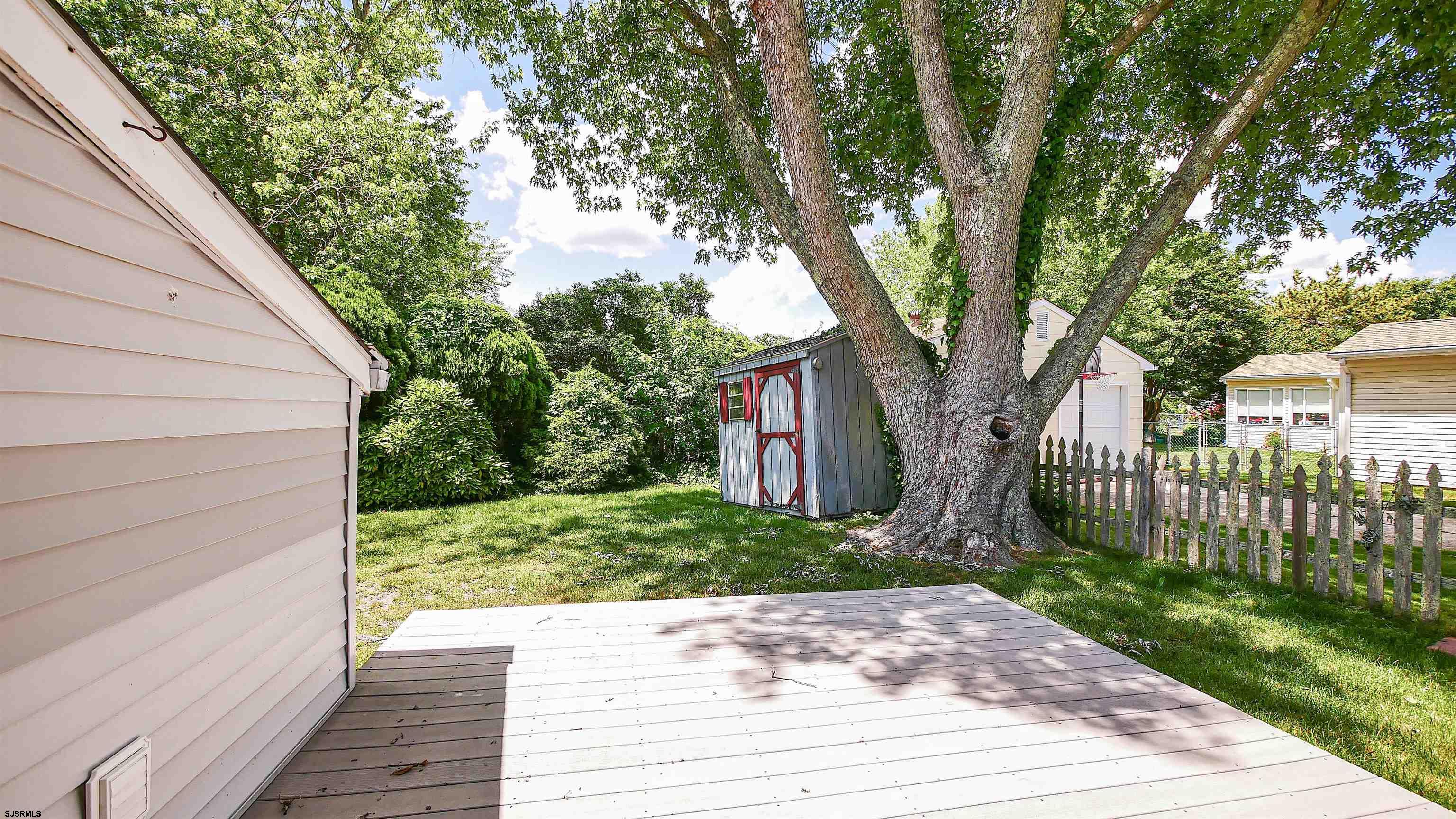 8 Malvern Road Somers Point, NJ 08244 - Photo 27 of 31 a view of a garden with a tree