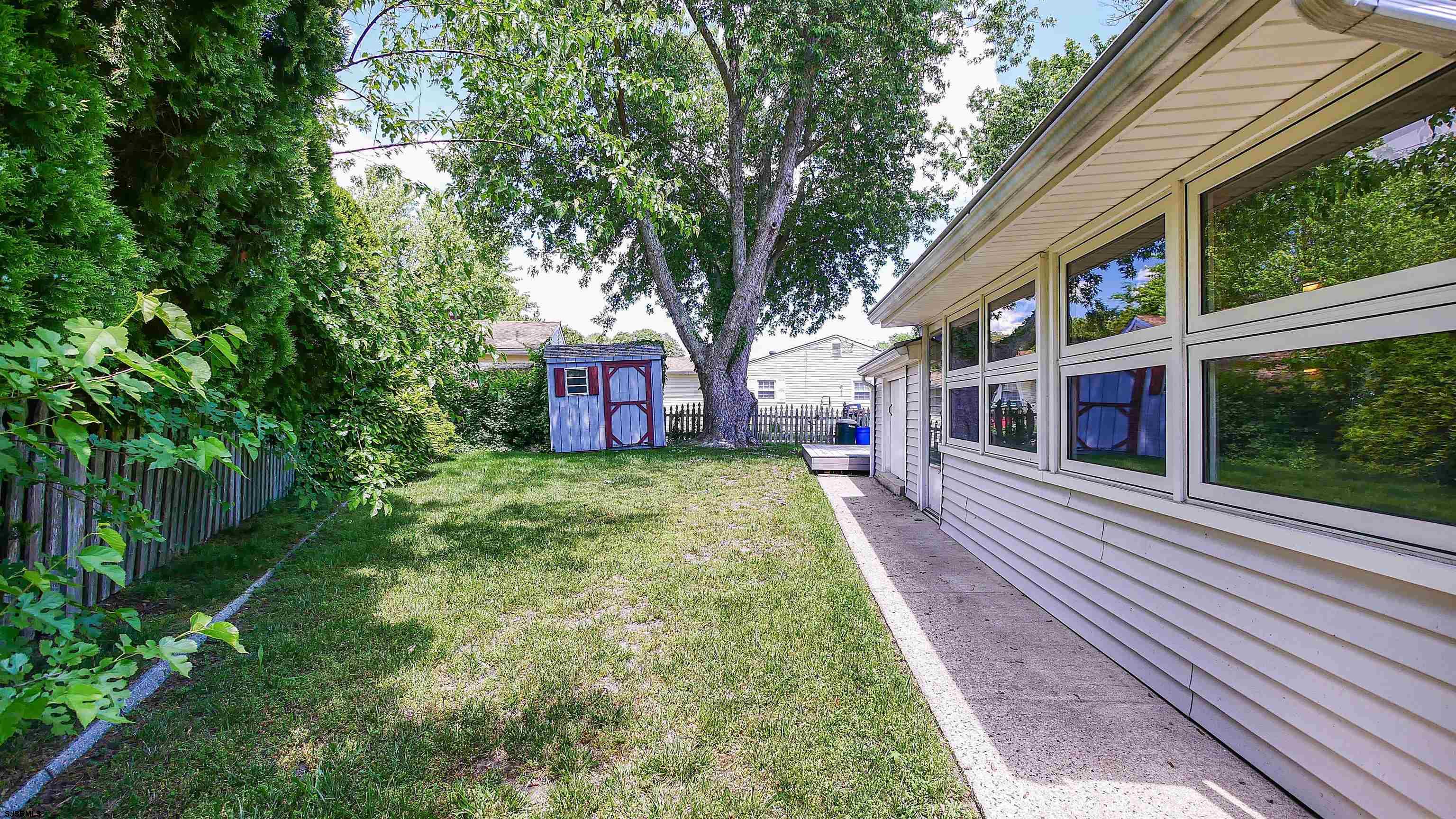 8 Malvern Road Somers Point, NJ 08244 - Photo 28 of 31 a view of a house with a yard