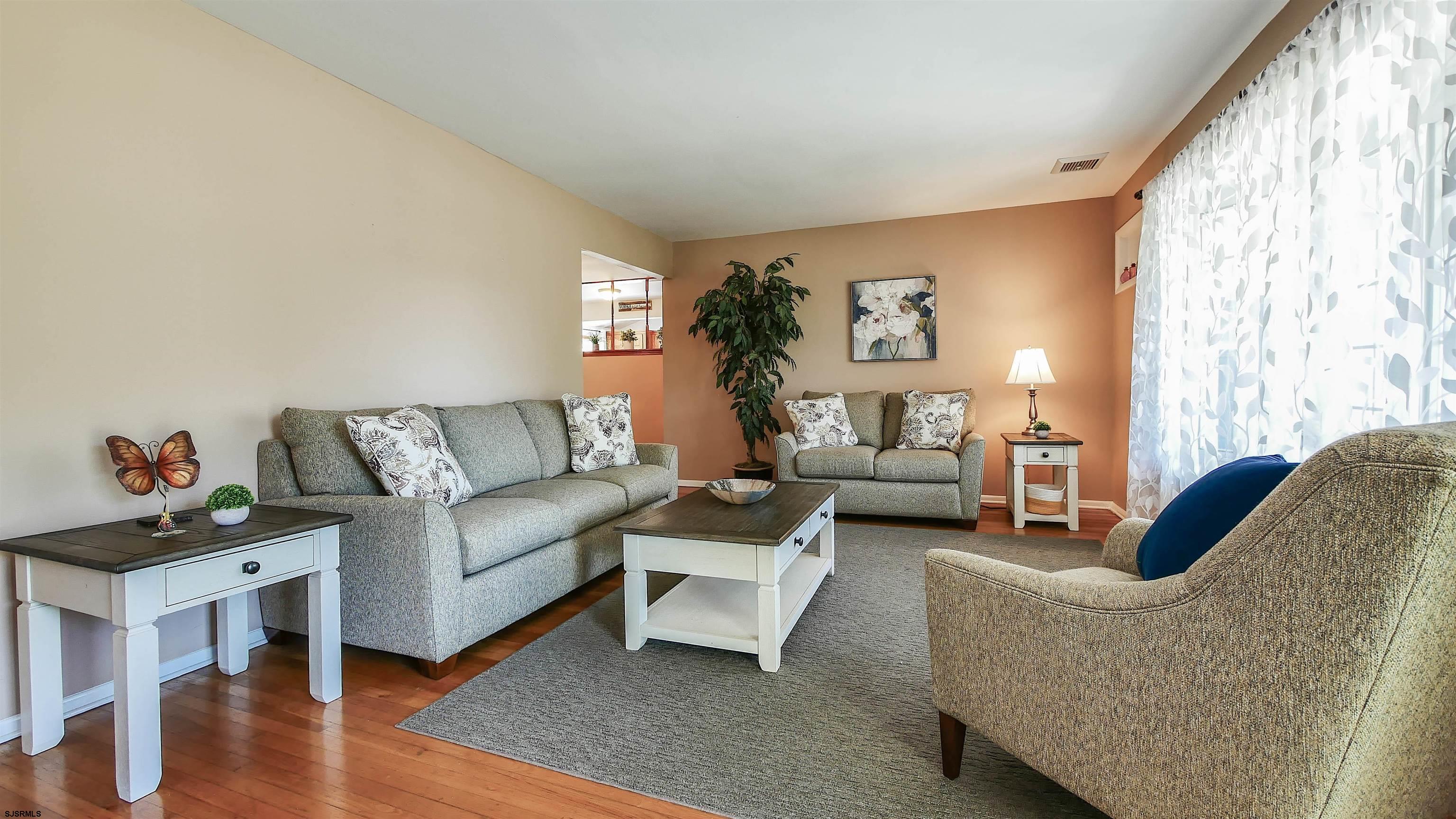 8 Malvern Road Somers Point, NJ 08244 - Photo 3 of 31 a living room with furniture and a large window