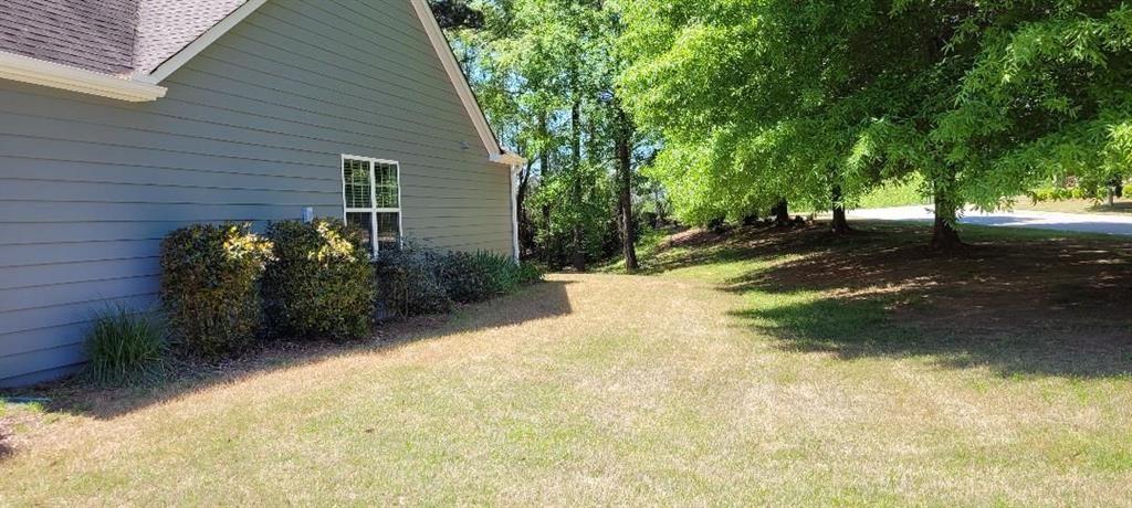 310 Andrew Ridge Drive Jefferson, GA 30549 - Photo 4 of 52 a view of a backyard with large trees