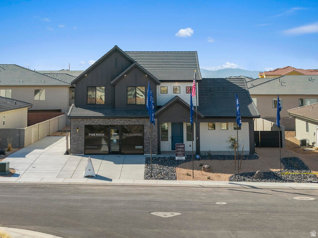 382 North Rhyolite Drive, Unit 111 Hurricane, UT 84737 - Photo 1 of 37 Contemporary two-story residence with a dark gray and white exterior