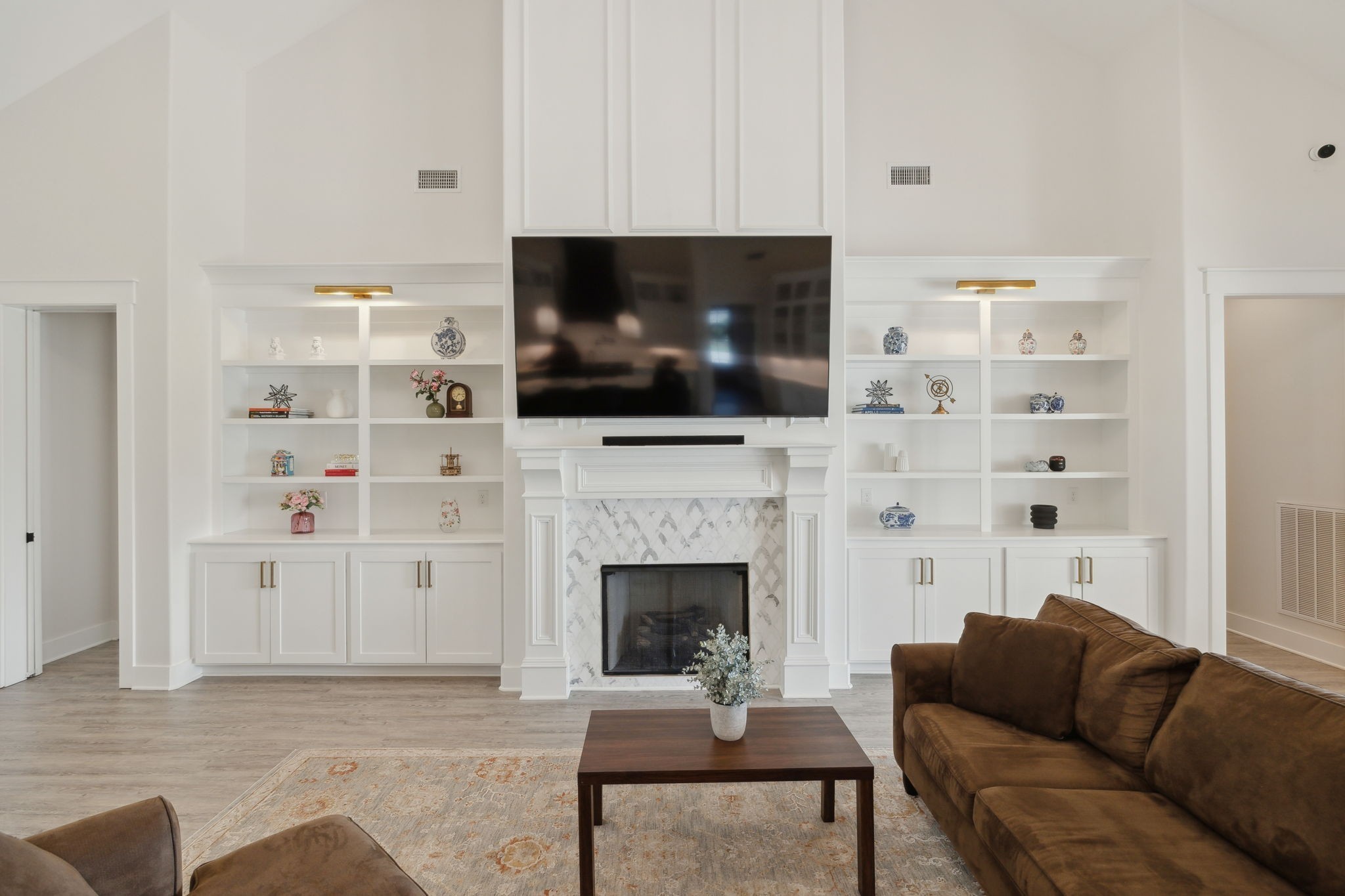 2648 Wilson Overall Road Murfreesboro, TN 37127 - Photo 50 of 92 a living room with furniture a flat screen tv and a fireplace
