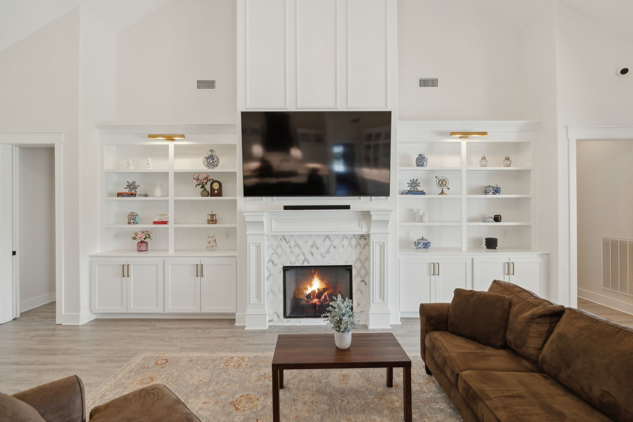 2648 Wilson Overall Road Murfreesboro, TN 37127 - Photo 51 of 92 a living room with furniture a flat screen tv and a fireplace