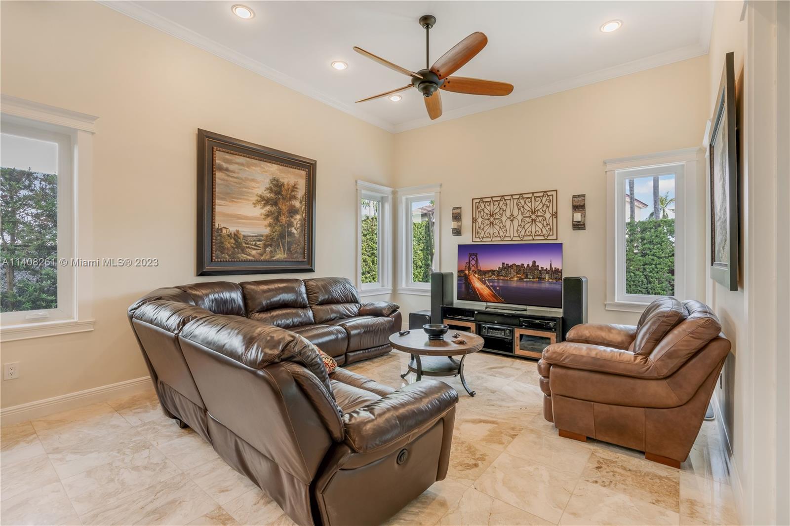 13151 Northwest 7th Street Miami, FL 33172 - Photo 20 of 48 a living room with furniture and a flat screen tv