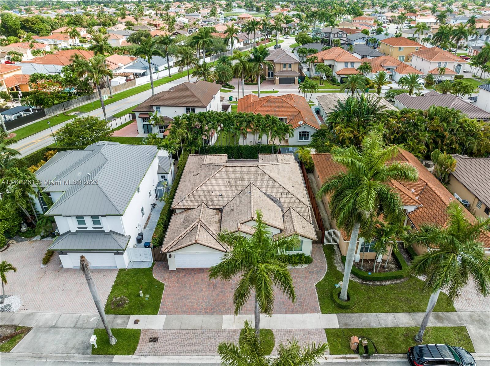 13151 Northwest 7th Street Miami, FL 33172 - Photo 46 of 48 an aerial view of residential houses with outdoor space and street view