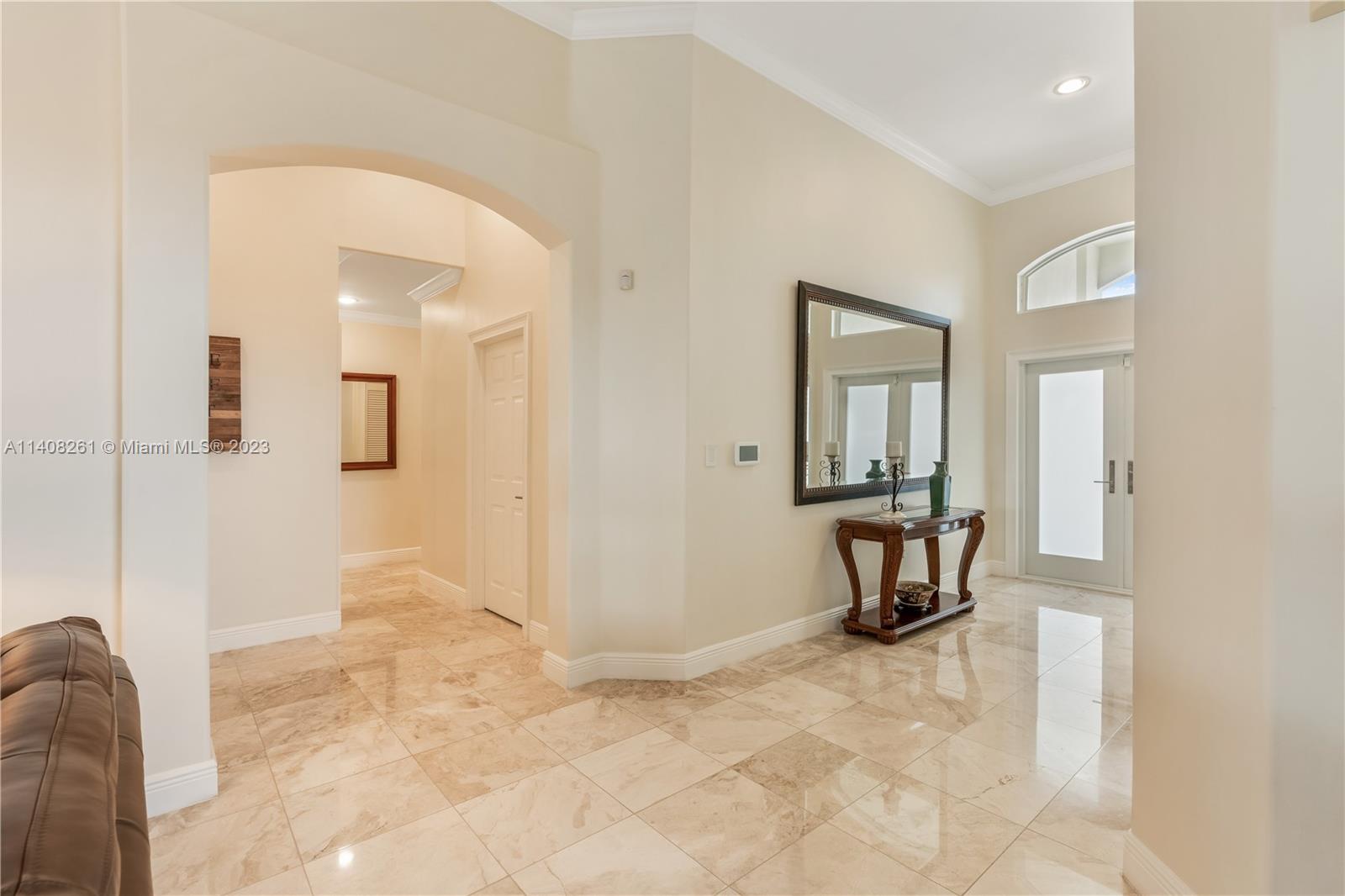 13151 Northwest 7th Street Miami, FL 33172 - Photo 10 of 48 a view of a livingroom with wooden floor and furniture