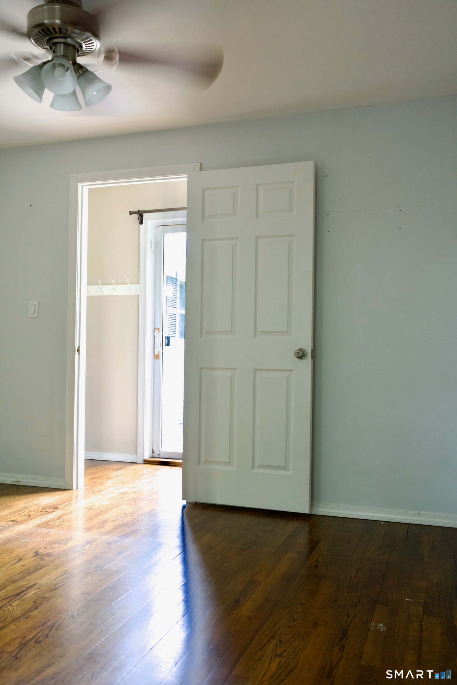 259 Peck Hill Road Woodbridge, CT 06525 - Photo 22 of 32 a view of an empty room with wooden floor
