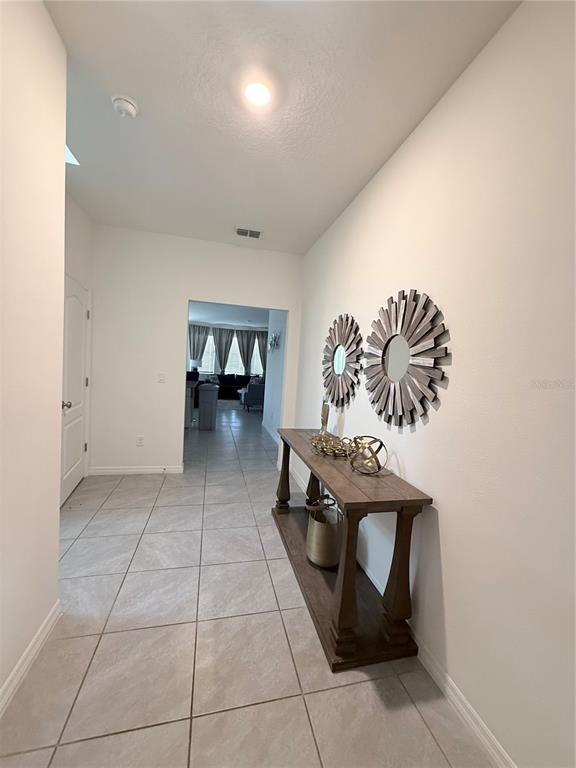 7523 Oakmoss Loop Davenport, FL 33837 - Photo 3 of 73