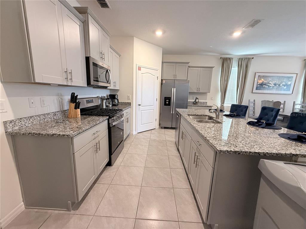 7523 Oakmoss Loop Davenport, FL 33837 - Photo 8 of 73