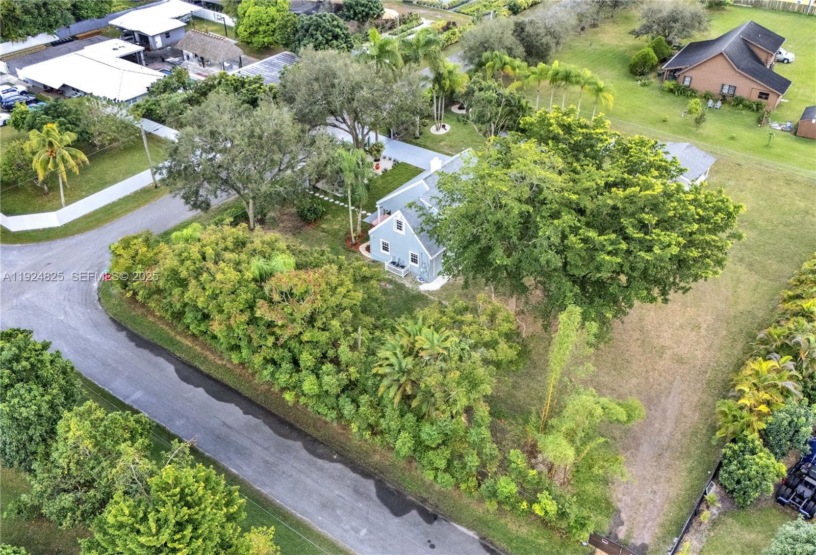 22820 Southwest 179th Place Miami, FL 33170 - Photo 23 of 56 an aerial view of a garden