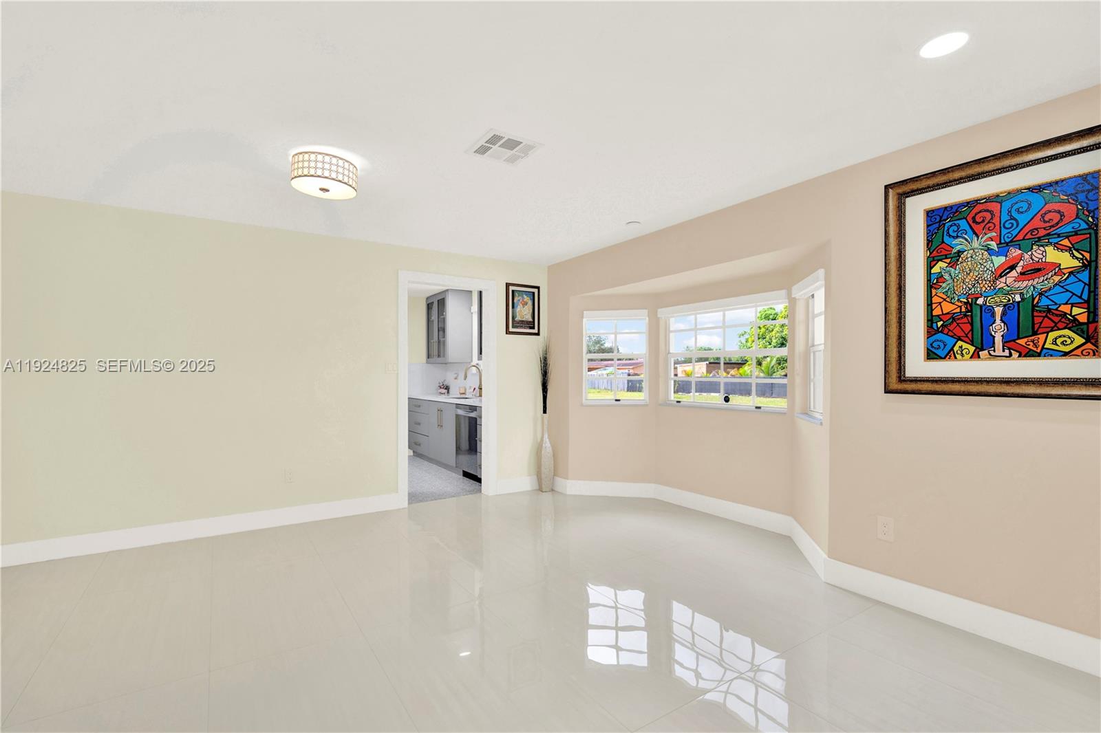 22820 Southwest 179th Place Miami, FL 33170 - Photo 27 of 56 wooden floor in an empty room with a window