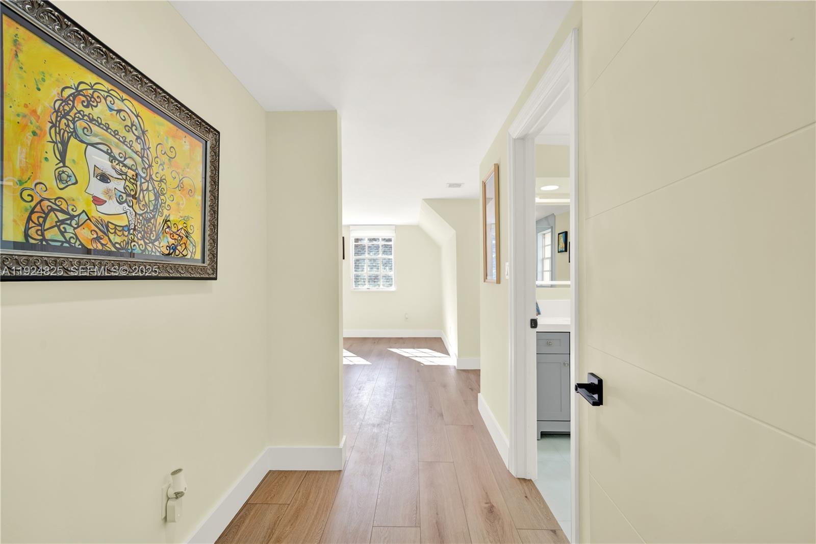 22820 Southwest 179th Place Miami, FL 33170 - Photo 41 of 56 a view of a hallway with wooden floor