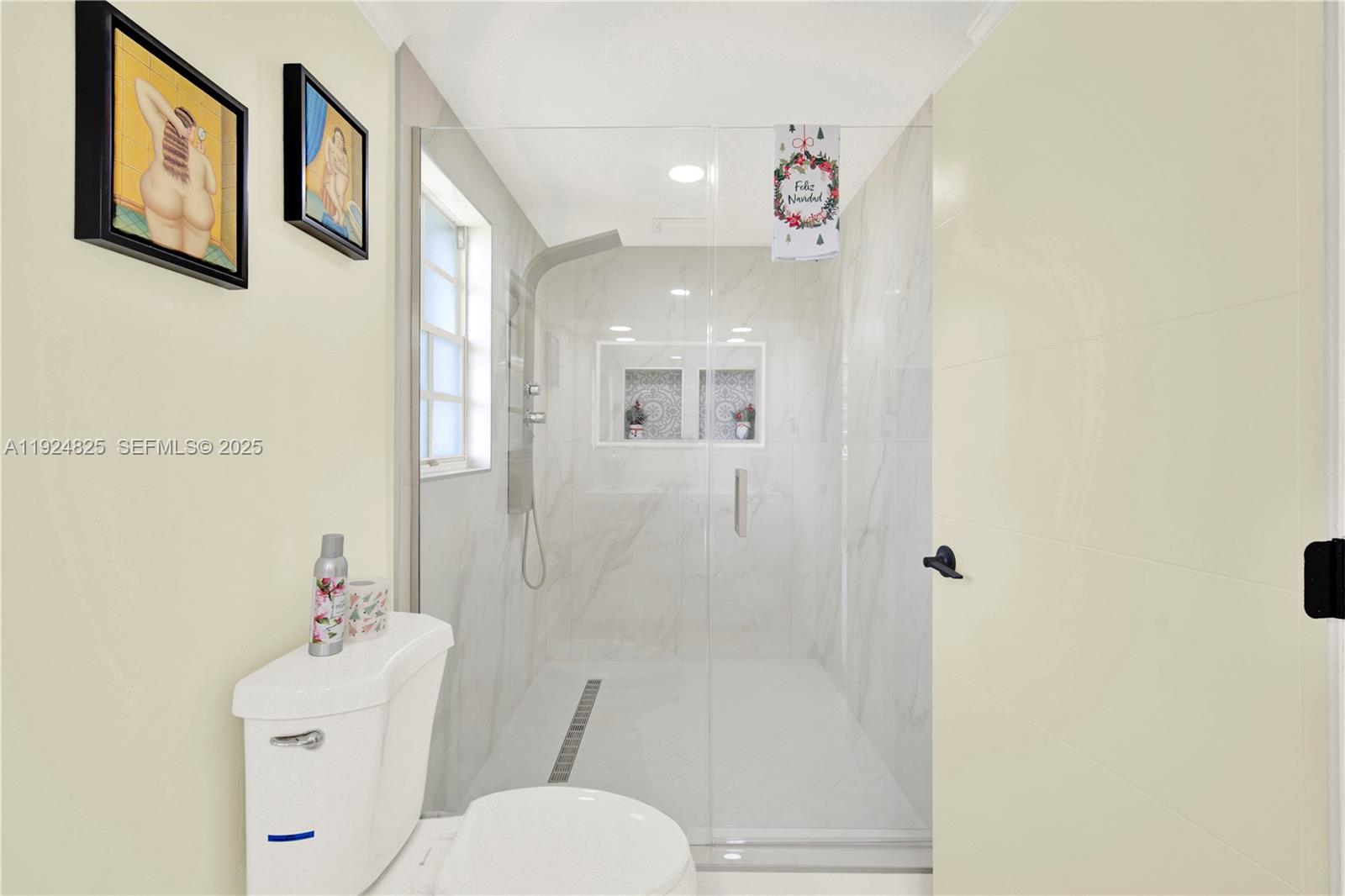22820 Southwest 179th Place Miami, FL 33170 - Photo 46 of 56 a bathroom with a sink mirror toilet and shower