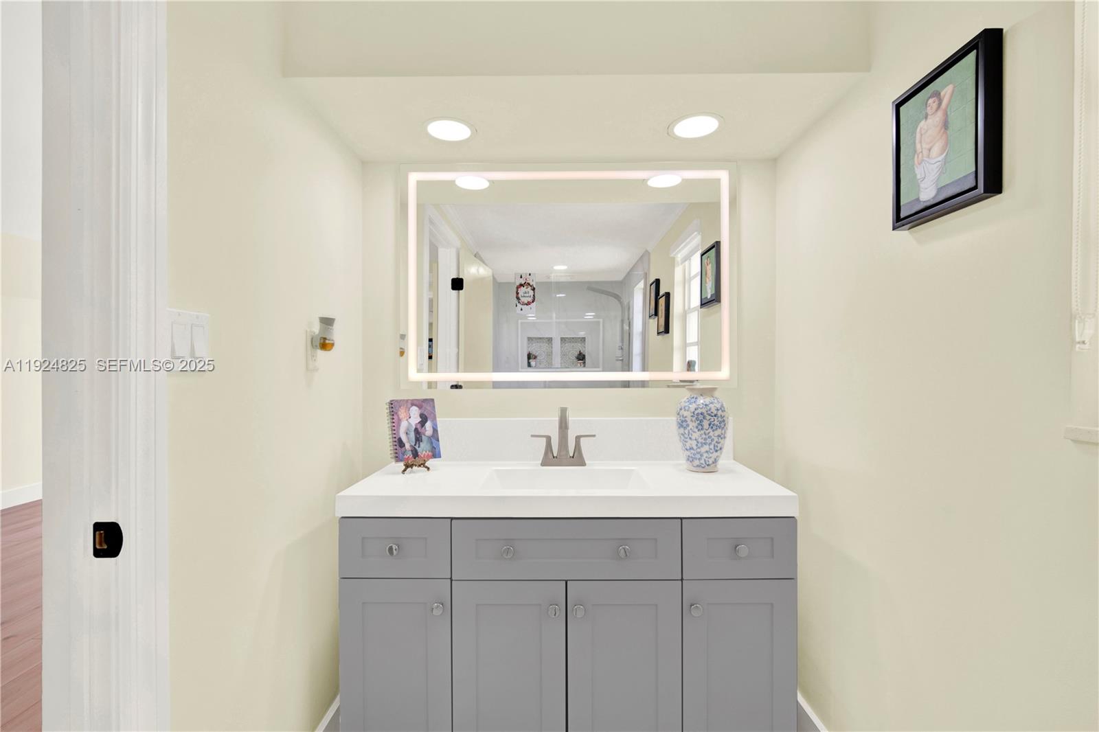 22820 Southwest 179th Place Miami, FL 33170 - Photo 48 of 56 a bathroom with a sink and a mirror