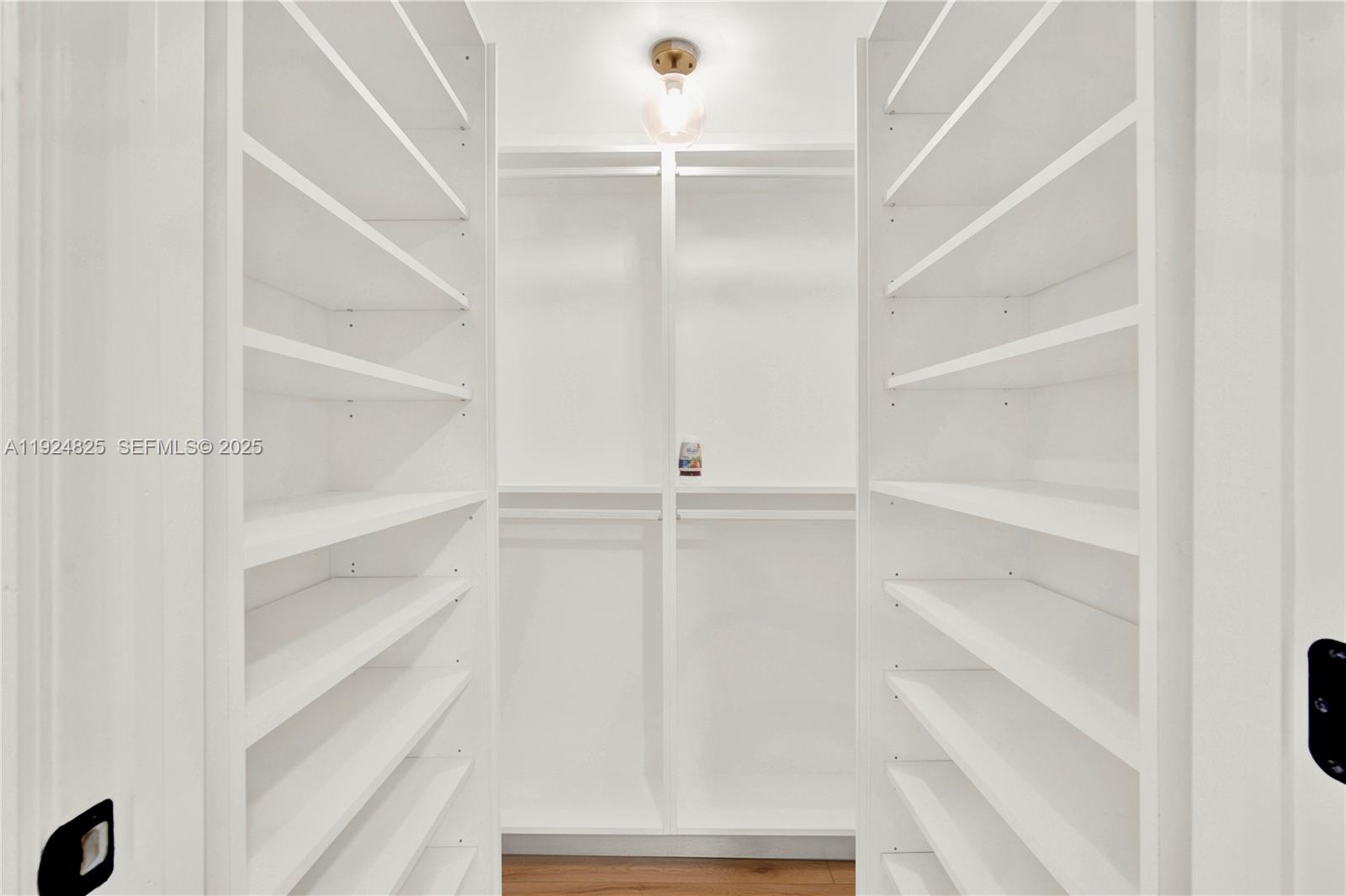 22820 Southwest 179th Place Miami, FL 33170 - Photo 50 of 56 a view of an empty walk in closet