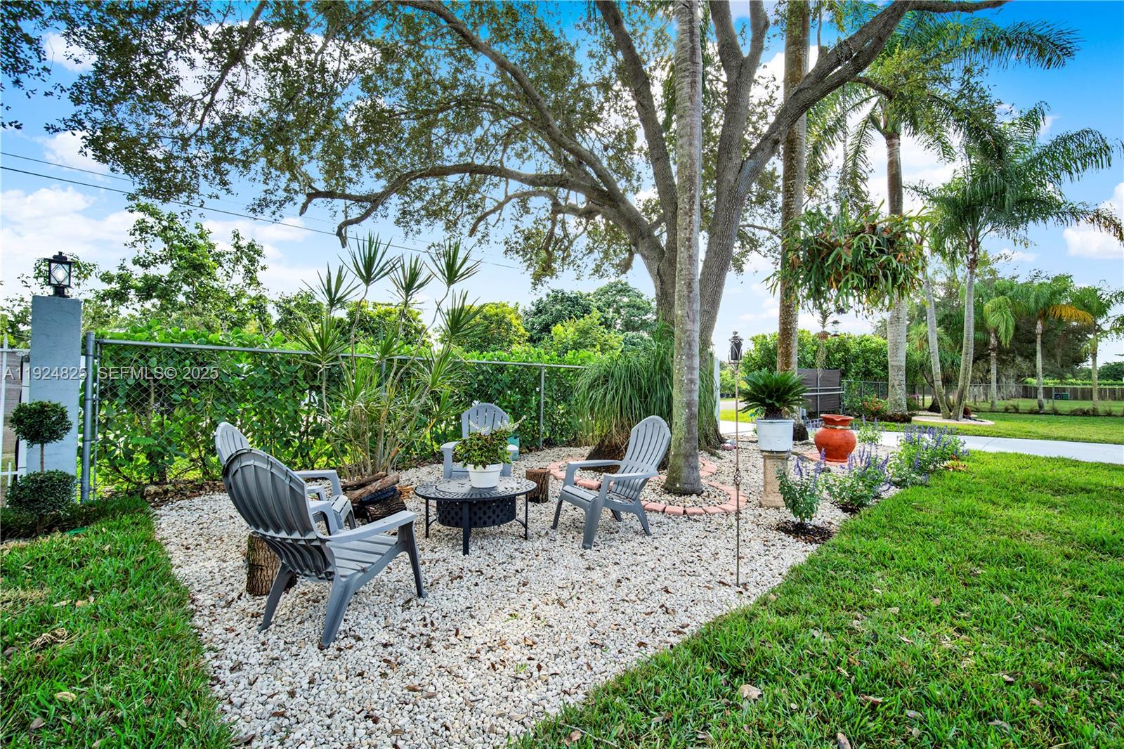 22820 Southwest 179th Place Miami, FL 33170 - Photo 5 of 56 a view of a sitting area with furniture and garden