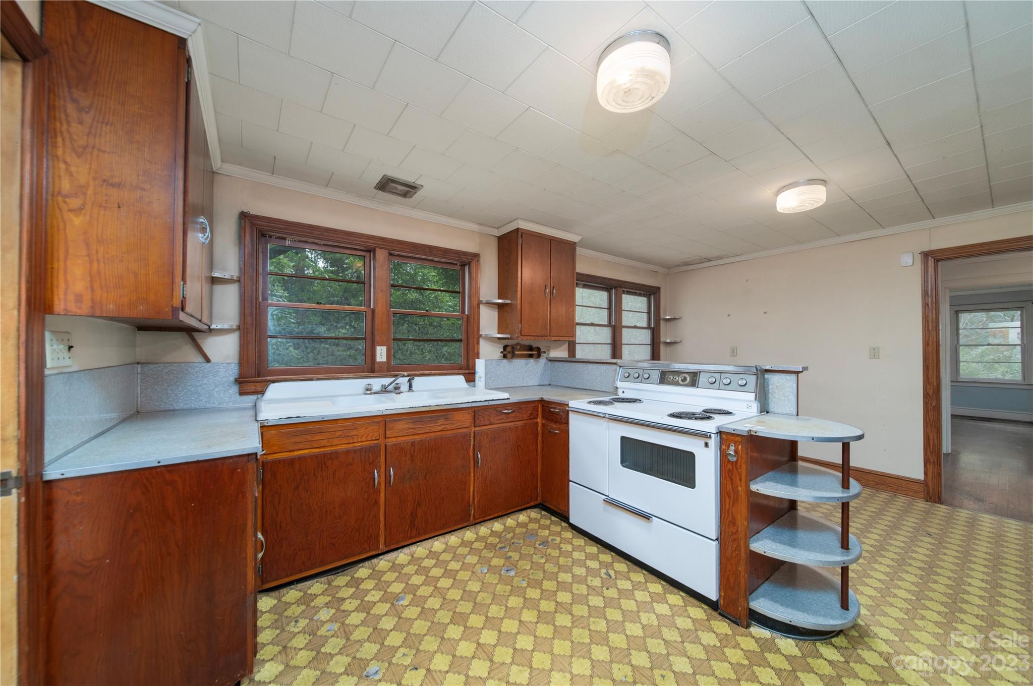 3980 Woodleaf Road Salisbury, NC 28147 - Photo 13 of 34 a kitchen with stainless steel appliances granite countertop a sink and cabinets