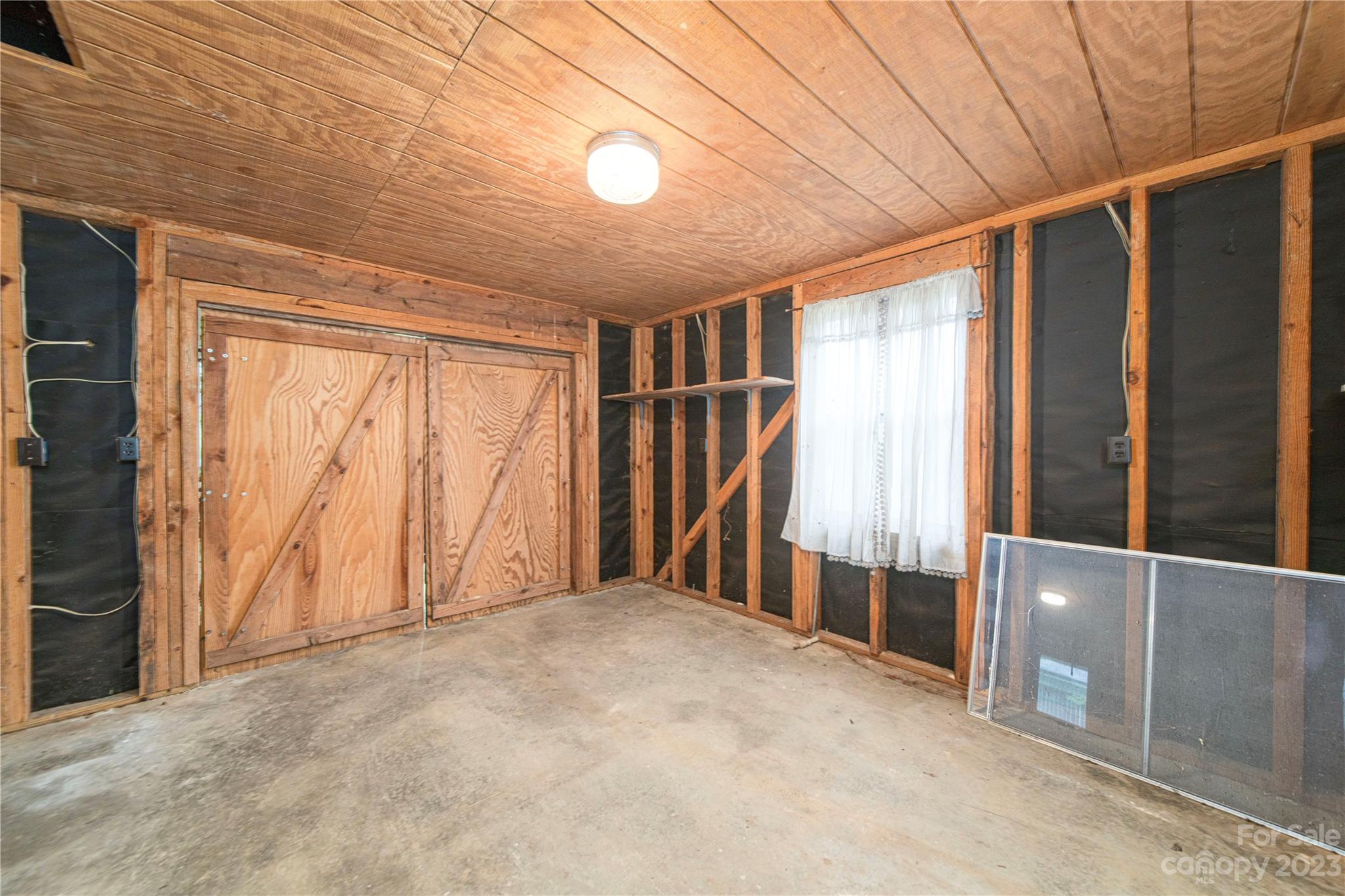 3980 Woodleaf Road Salisbury, NC 28147 - Photo 20 of 34 a view of an empty room with a window