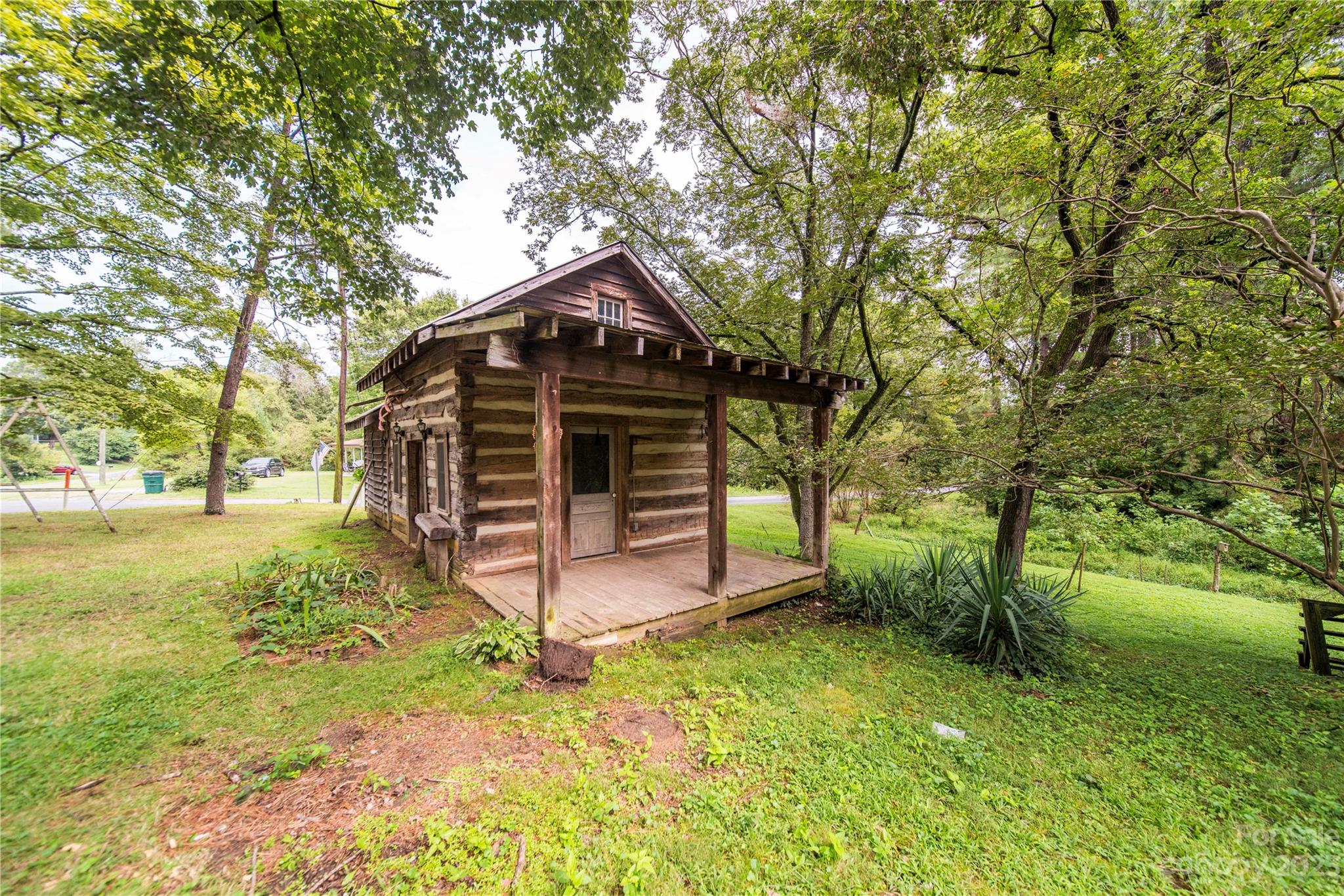 3980 Woodleaf Road Salisbury, NC 28147 - Photo 2 of 34 a front view of a house with a yard