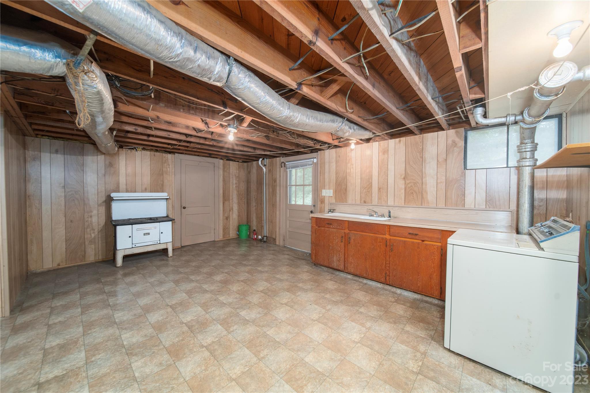 3980 Woodleaf Road Salisbury, NC 28147 - Photo 23 of 34 a view of a storage & utility room with washer and dryer