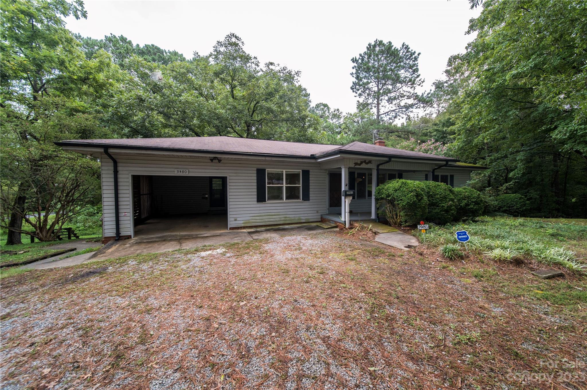 3980 Woodleaf Road Salisbury, NC 28147 - Photo 33 of 34 a house with trees in the background