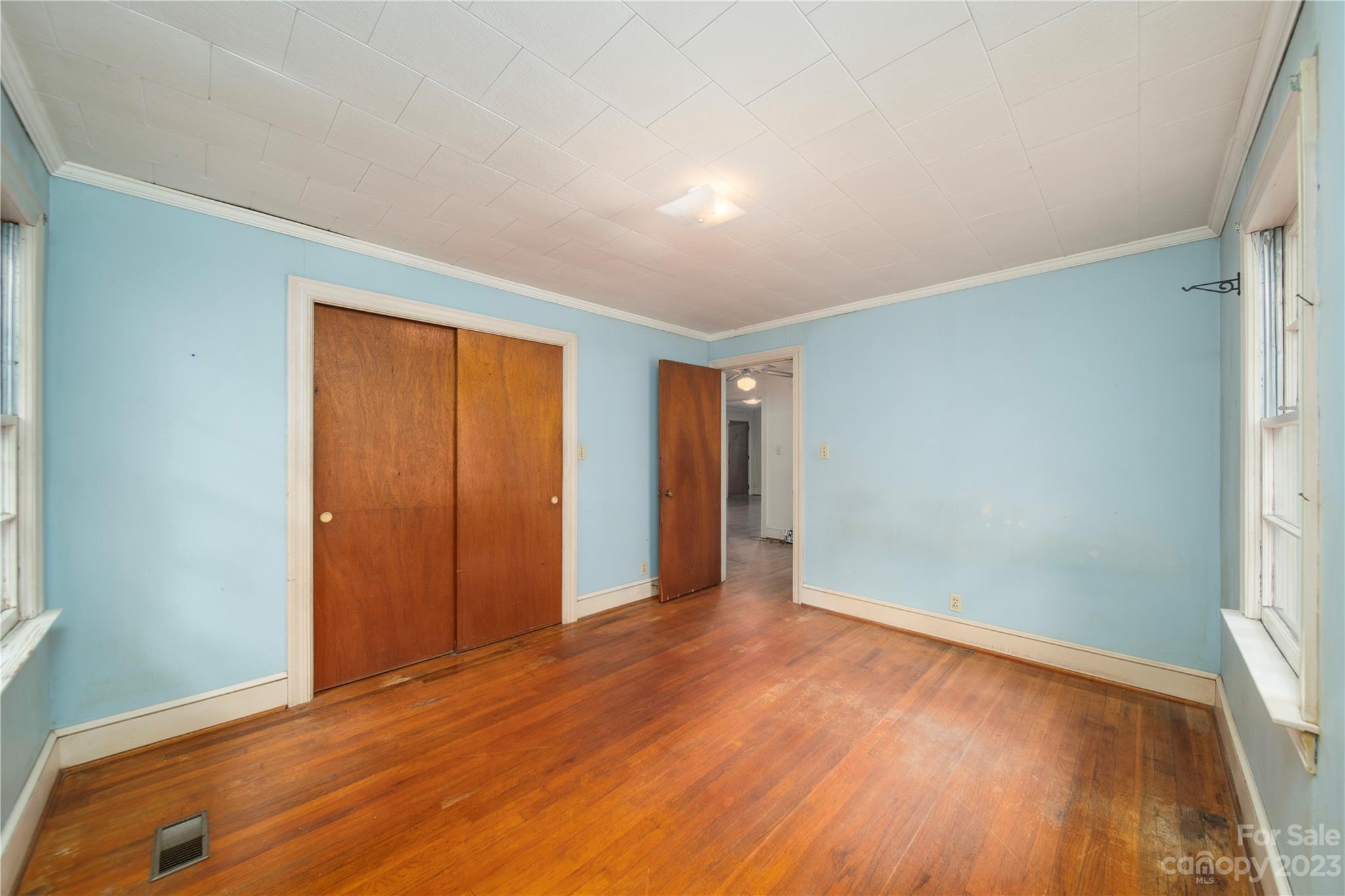 3980 Woodleaf Road Salisbury, NC 28147 - Photo 7 of 34 a view of an empty room and wooden floor