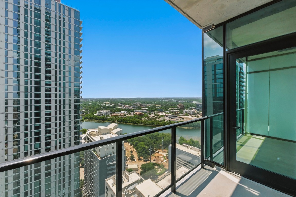 610 Davis Street, Unit 3104 Austin, TX 78701 - Photo 20 of 40 Balcony with a water view and a view of city