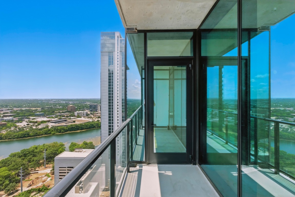 610 Davis Street, Unit 3104 Austin, TX 78701 - Photo 4 of 40 Balcony with a water view and a city view