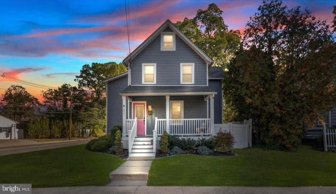 501 Rhoads Avenue Haddonfield, NJ 08033 - Photo 1 of 29 a front view of a house with garden