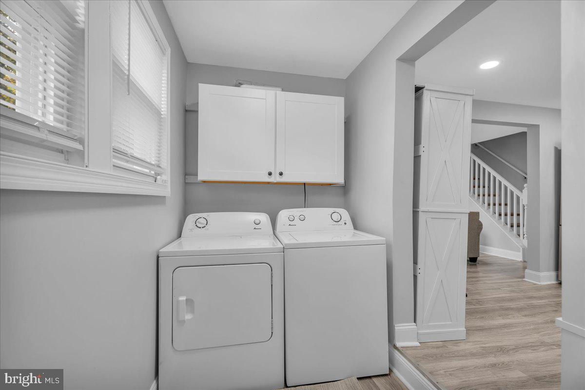 501 Rhoads Avenue Haddonfield, NJ 08033 - Photo 14 of 29 a view of storage and utility room with washer and dryer