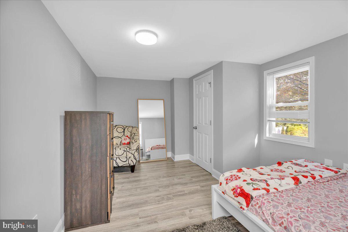 501 Rhoads Avenue Haddonfield, NJ 08033 - Photo 19 of 29 a bedroom with a bed and a window