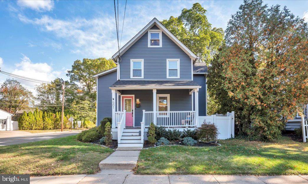 501 Rhoads Avenue Haddonfield, NJ 08033 - Photo 2 of 29 a front view of a house with garden