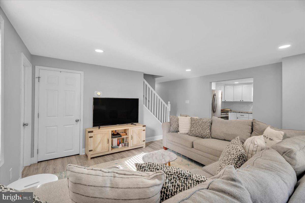 501 Rhoads Avenue Haddonfield, NJ 08033 - Photo 8 of 29 a living room with furniture and a flat screen tv