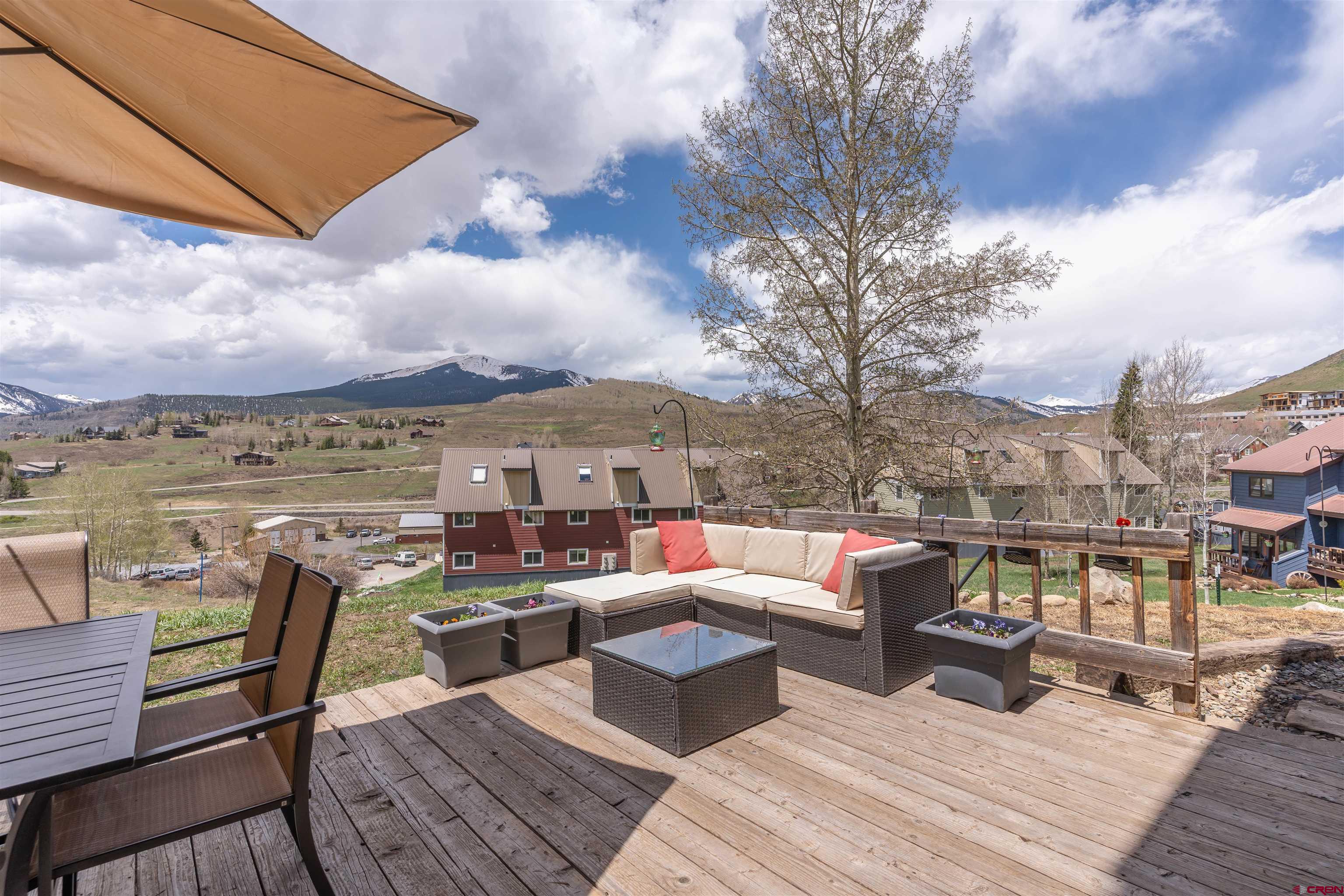31 Castle Road, Unit 1 Crested Butte, CO 81225 - Photo 12 of 17 a view of a terrace with seating area