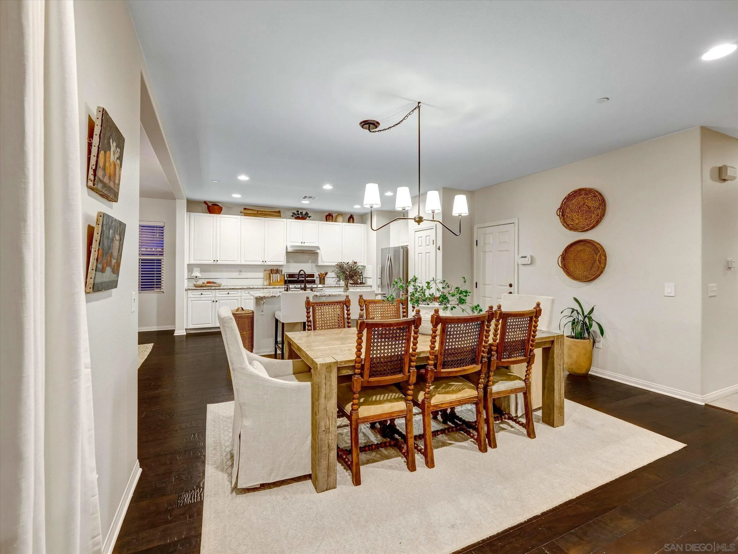 37244 Avocet Way Murrieta, CA 92563 - Photo 17 of 71 a large kitchen with a table and chairs