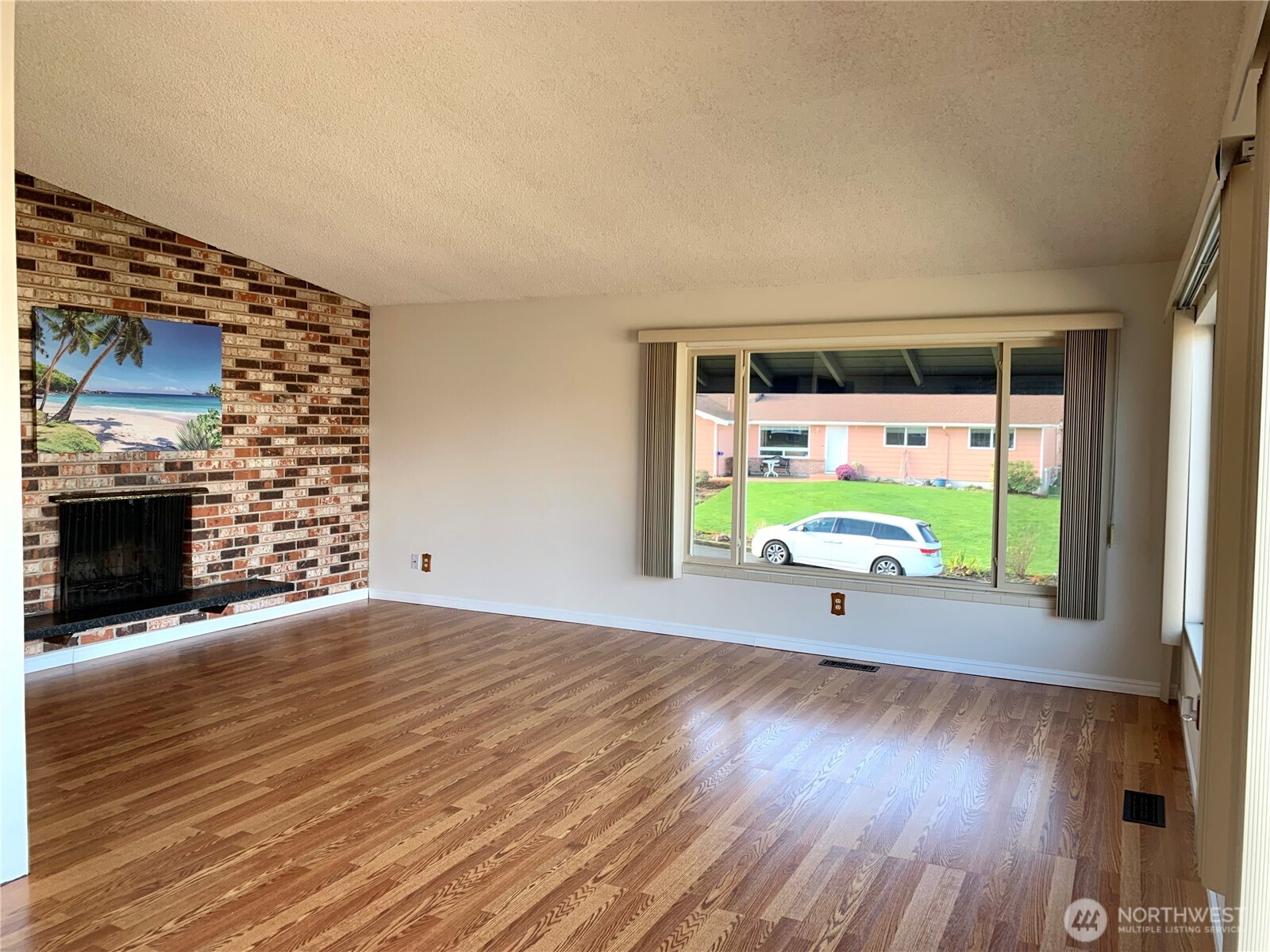 29818 4th Avenue Southwest Federal Way, WA 98023 - Photo 14 of 40 a view of livingroom with furniture window and wooden floor