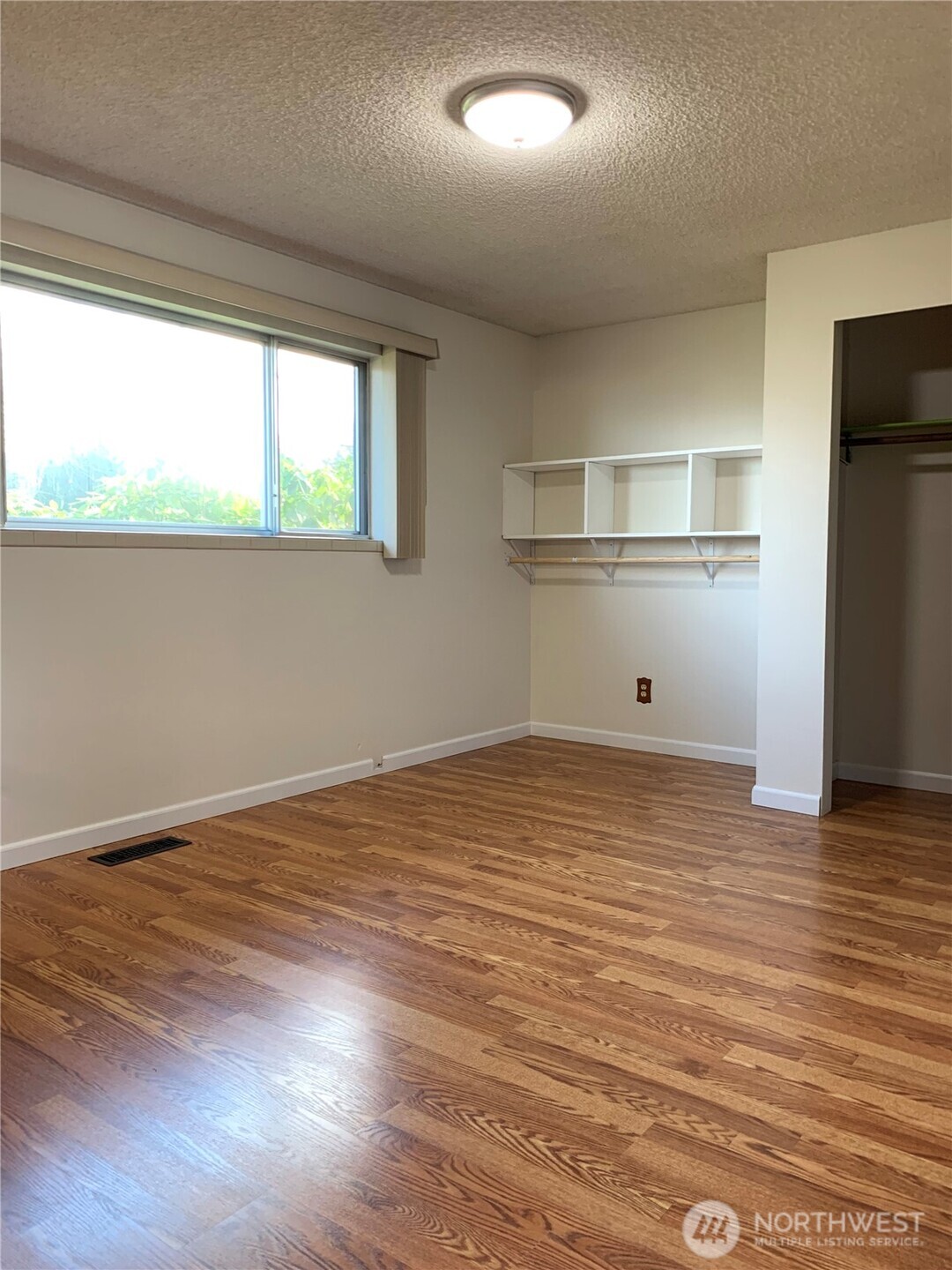 29818 4th Avenue Southwest Federal Way, WA 98023 - Photo 18 of 40 a view of empty room with wooden floor