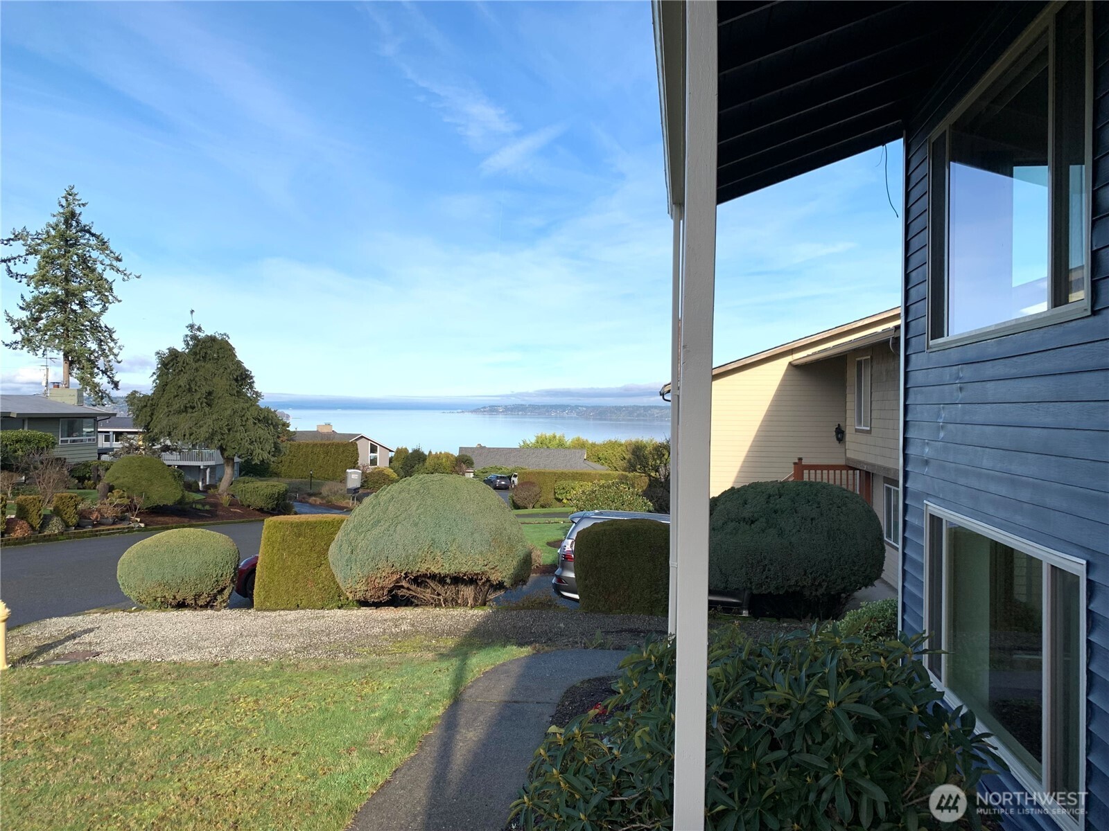 29818 4th Avenue Southwest Federal Way, WA 98023 - Photo 2 of 40 a view of a balcony with chair and table