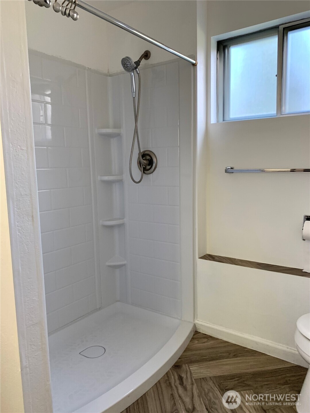 29818 4th Avenue Southwest Federal Way, WA 98023 - Photo 27 of 40 a bathroom with a shower and toilet
