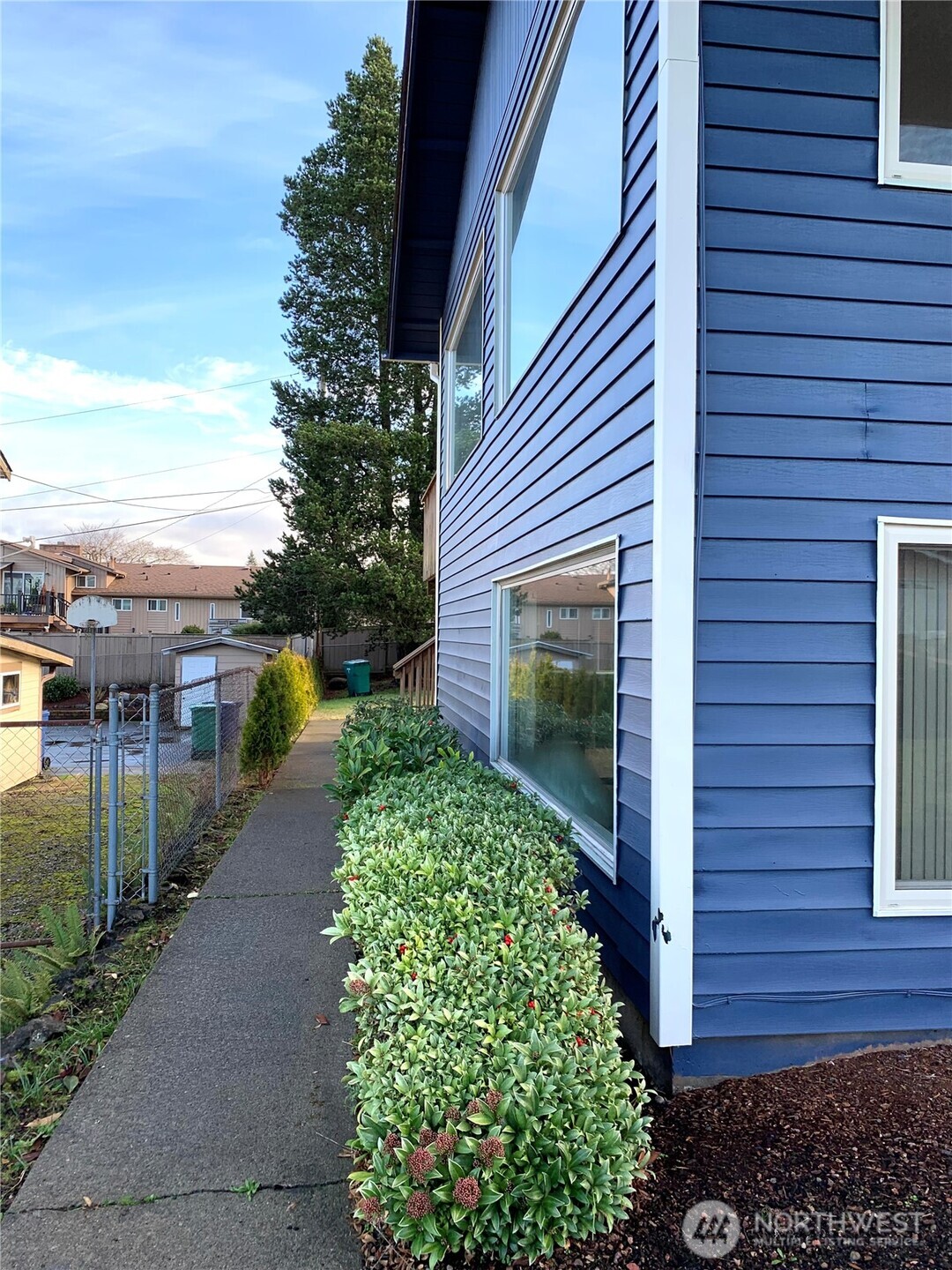 29818 4th Avenue Southwest Federal Way, WA 98023 - Photo 34 of 40 a front view of a house with a yard
