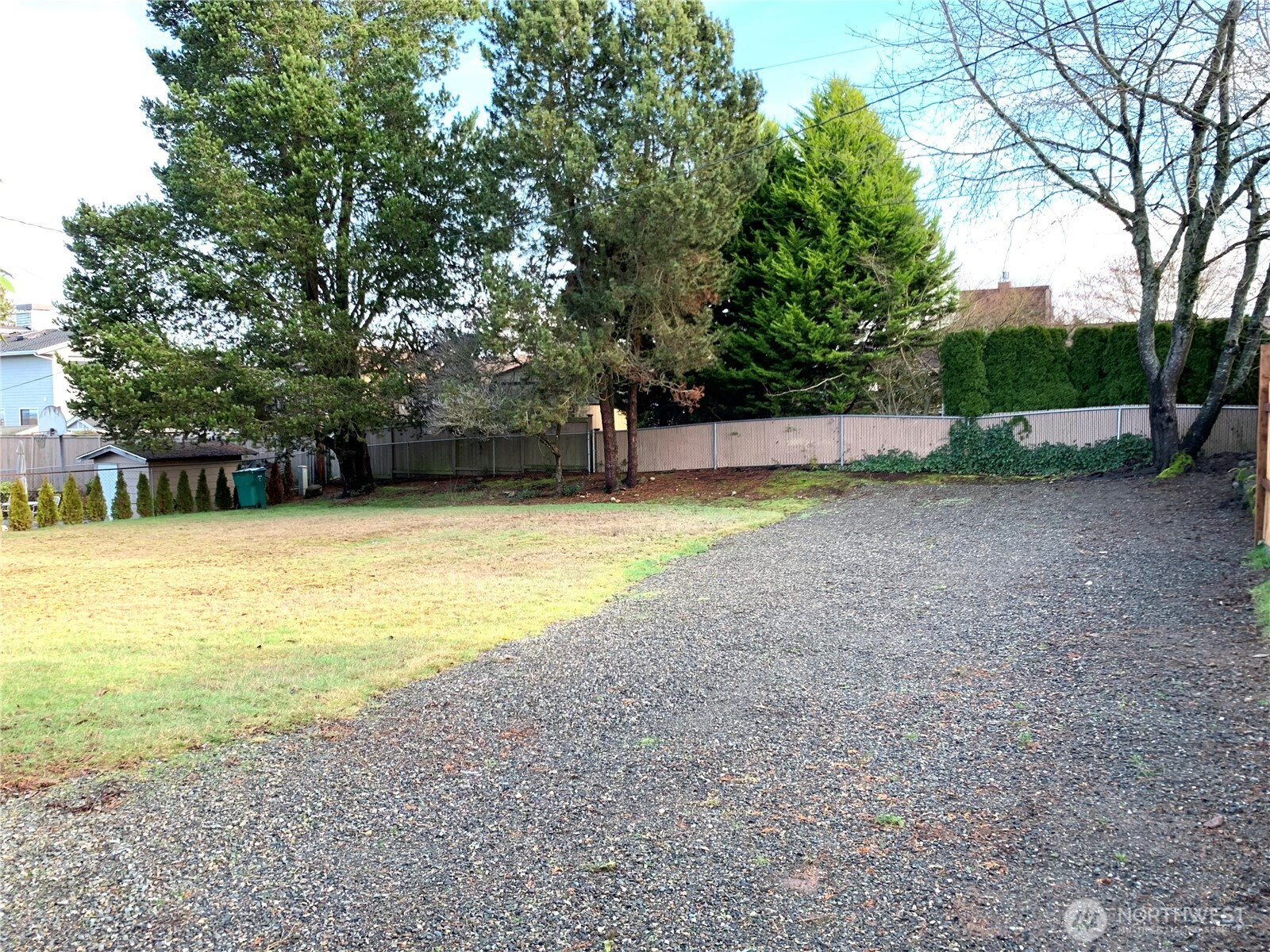 29818 4th Avenue Southwest Federal Way, WA 98023 - Photo 40 of 40 a view of a swimming pool and trees in the background