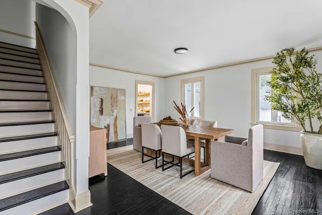 a work room with furniture and wooden floor