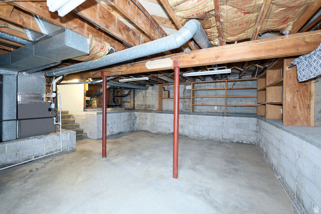 1272 Cook Street Ogden, UT 84404 - Photo 44 of 58 Unfinished basement space featuring exposed wood joists and concrete flooring