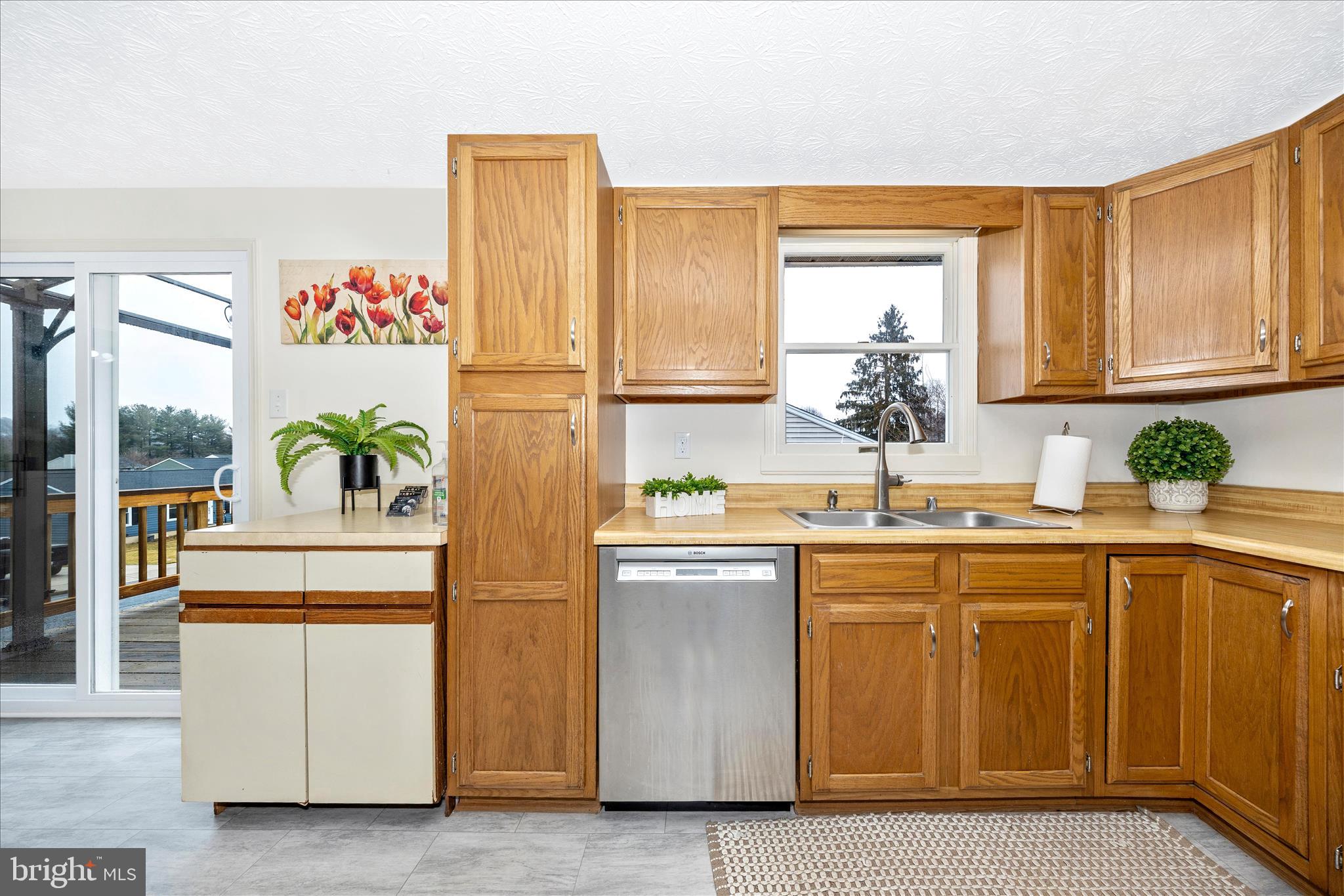3 Contour Road Mount Airy, MD 21771 - Photo 11 of 54 a kitchen with stainless steel appliances granite countertop a sink and a refrigerator