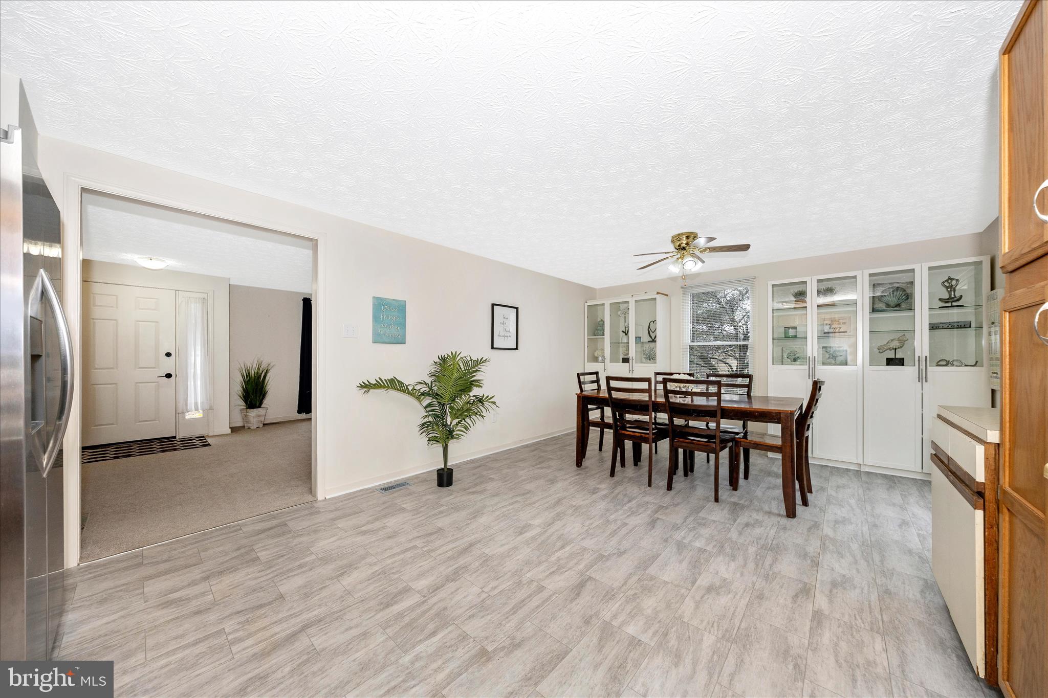3 Contour Road Mount Airy, MD 21771 - Photo 13 of 54 a view of a dining room with furniture and a table