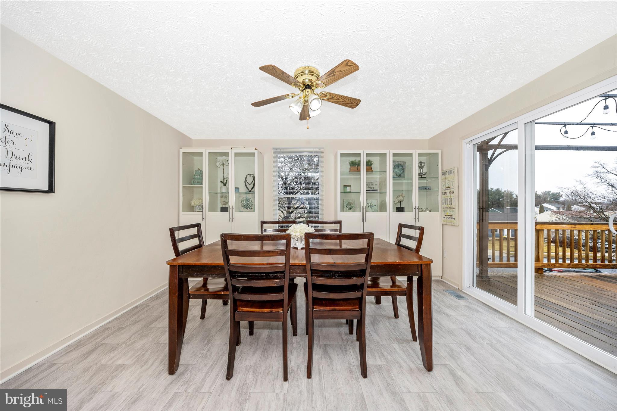 3 Contour Road Mount Airy, MD 21771 - Photo 14 of 54 a view of a dining room with furniture window and wooden floor